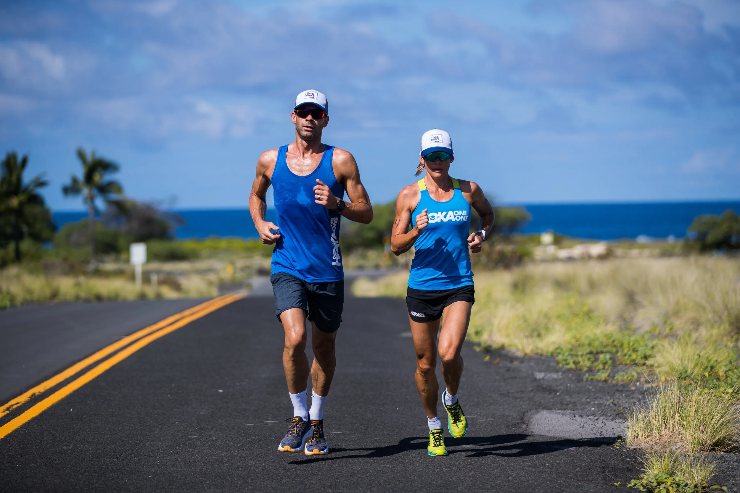Tim training with another athlete in Kona